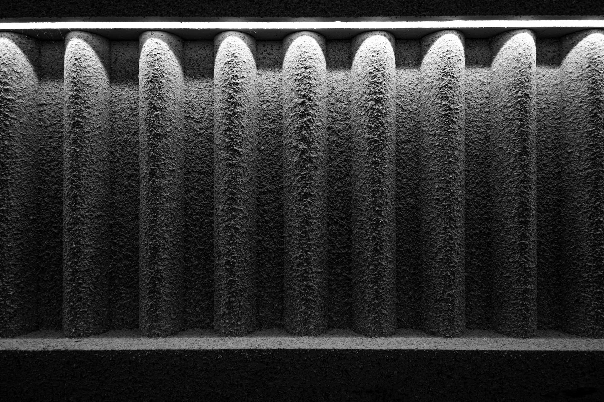 Close-up of a dusty, clogged pleated air filter